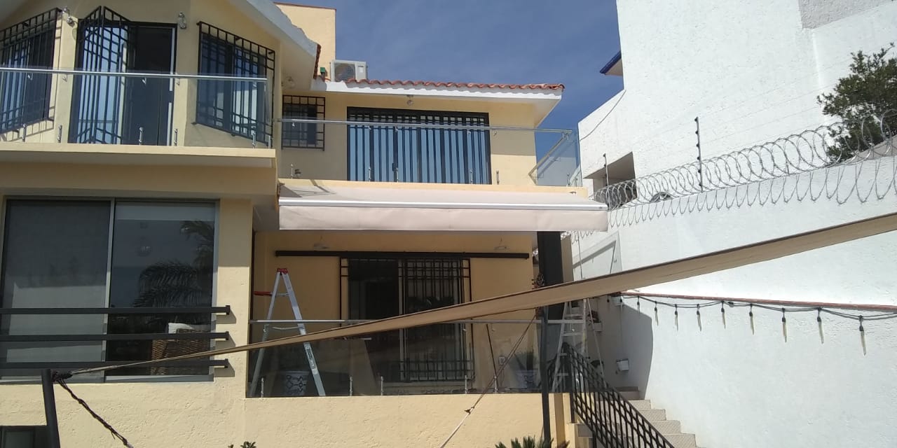 toldos proyeccion Home Land